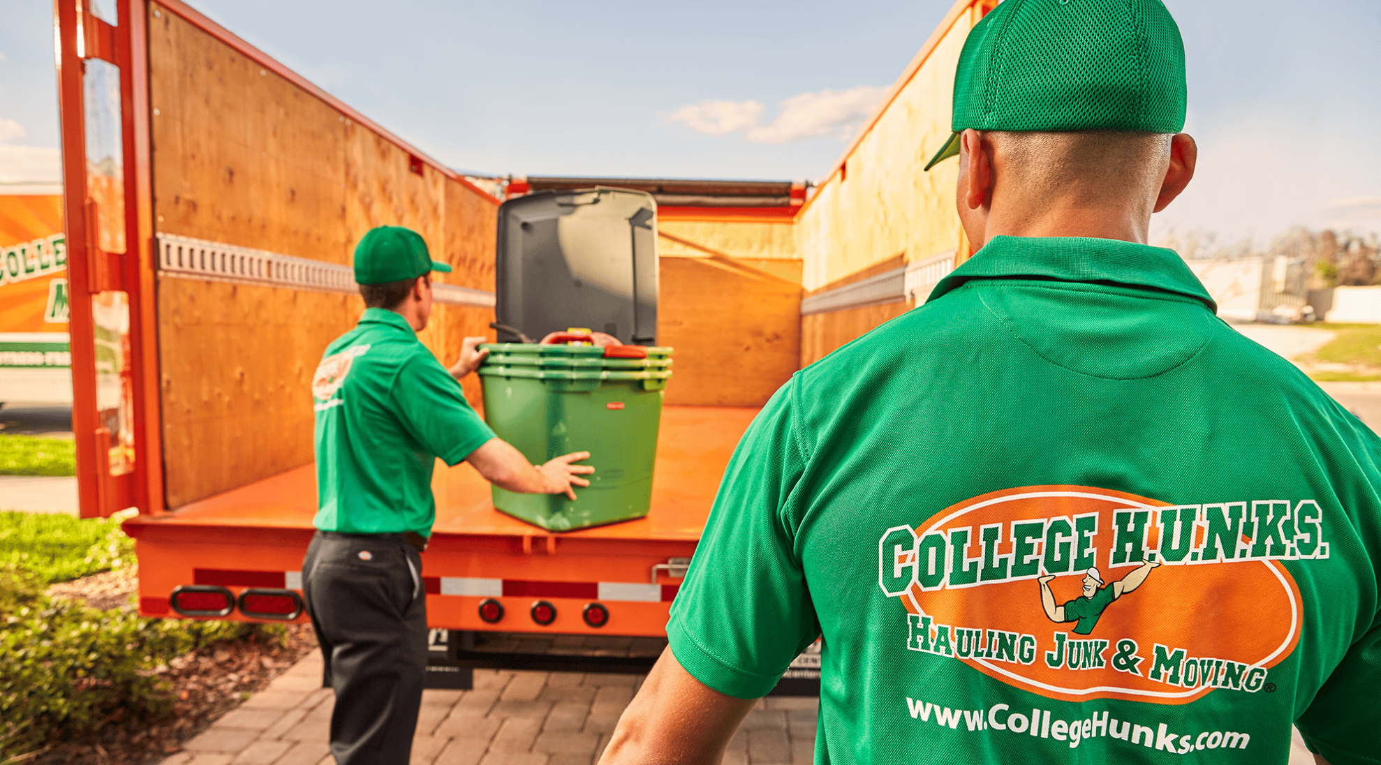 Junk removal franchise workers sorting materials responsibly